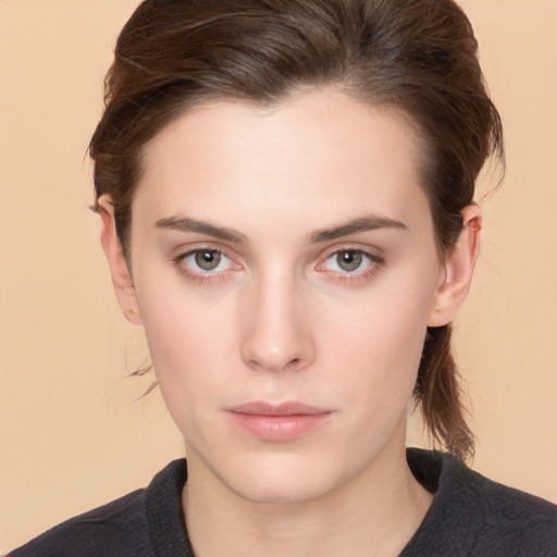 Neutral white young-adult female with medium  brown hair and brown eyes