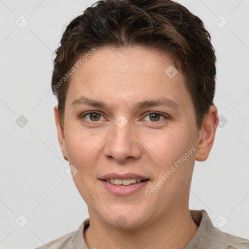 Joyful white adult female with short  brown hair and grey eyes