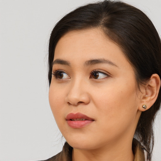 Neutral asian young-adult female with long  brown hair and brown eyes