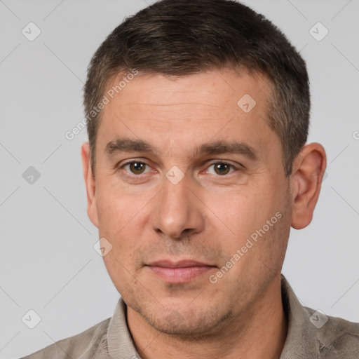 Neutral white adult male with short  brown hair and brown eyes