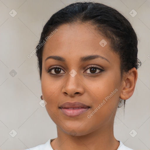 Joyful latino young-adult female with short  brown hair and brown eyes