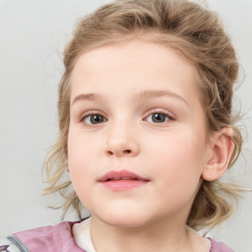 Neutral white child female with medium  brown hair and blue eyes