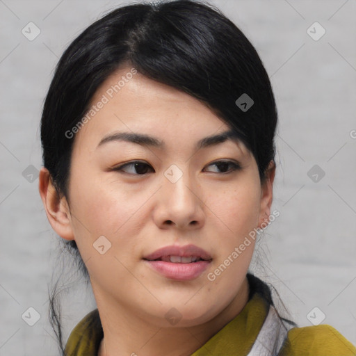 Joyful asian young-adult female with medium  black hair and brown eyes