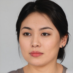 Neutral asian young-adult female with medium  black hair and brown eyes