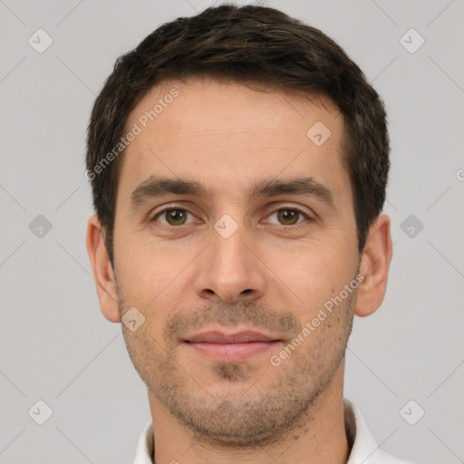 Joyful white young-adult male with short  brown hair and brown eyes