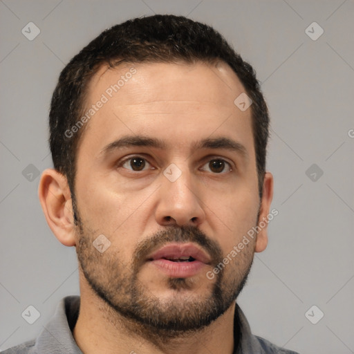 Neutral white young-adult male with short  black hair and brown eyes