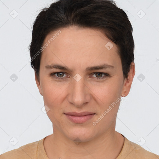 Joyful white young-adult female with short  brown hair and brown eyes