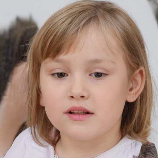 Neutral white child female with medium  brown hair and brown eyes