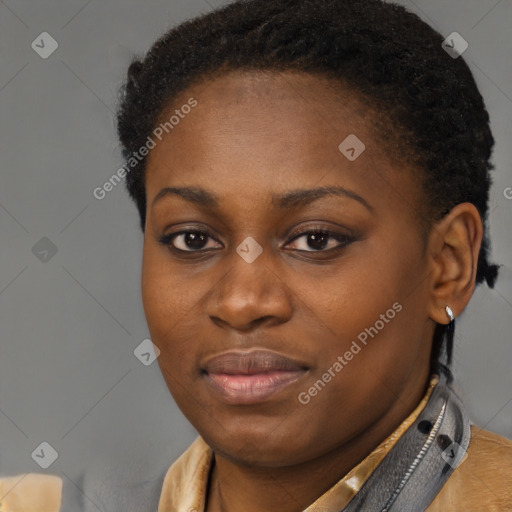 Joyful black young-adult female with short  brown hair and brown eyes