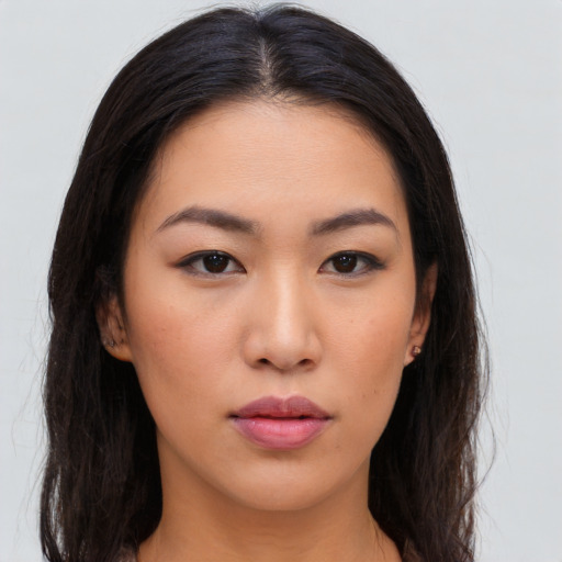 Neutral asian young-adult female with long  brown hair and brown eyes