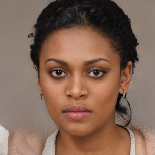 Neutral black young-adult female with short  black hair and brown eyes