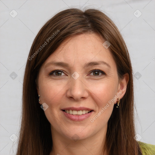 Joyful white adult female with long  brown hair and brown eyes