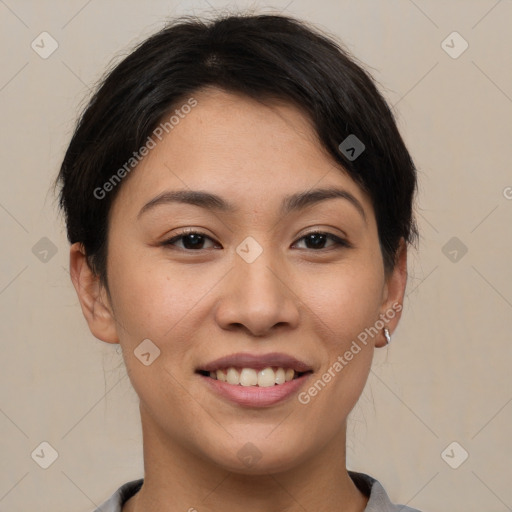 Joyful asian young-adult female with short  brown hair and brown eyes