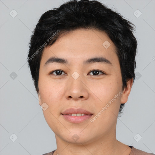 Joyful asian young-adult male with short  black hair and brown eyes