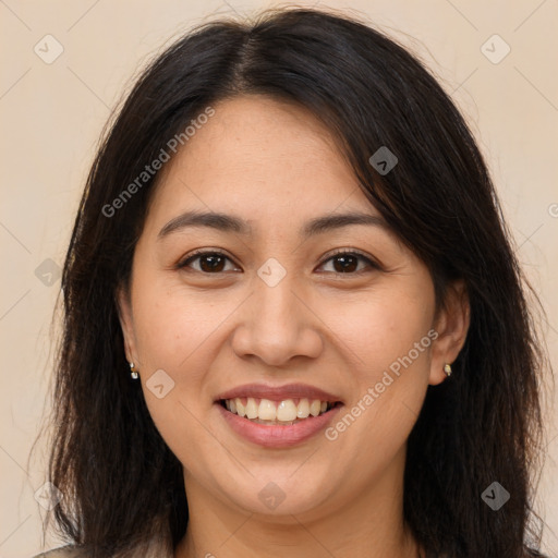 Joyful white young-adult female with long  brown hair and brown eyes