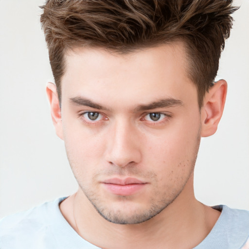 Neutral white young-adult male with short  brown hair and brown eyes