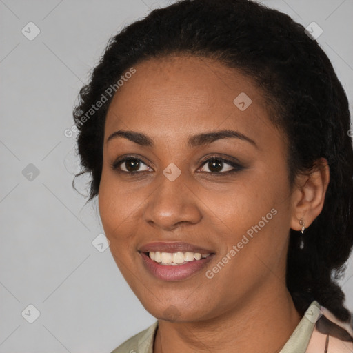 Joyful black young-adult female with medium  black hair and brown eyes