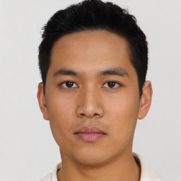 Neutral asian young-adult male with short  black hair and brown eyes