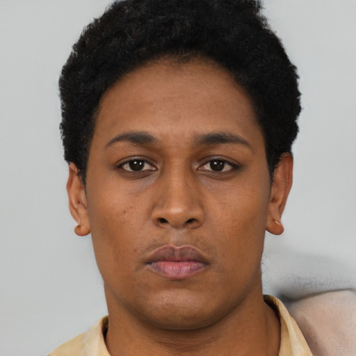 Neutral black young-adult female with short  brown hair and brown eyes