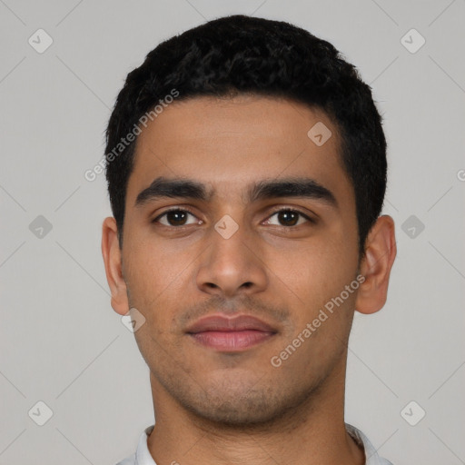 Neutral latino young-adult male with short  black hair and brown eyes