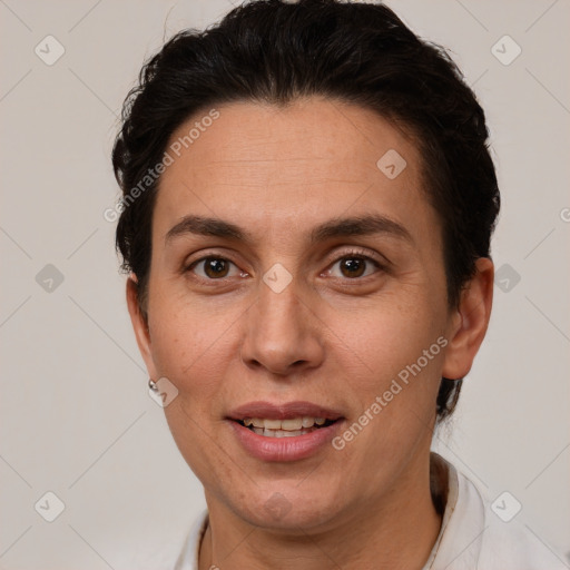 Joyful white adult female with short  brown hair and brown eyes