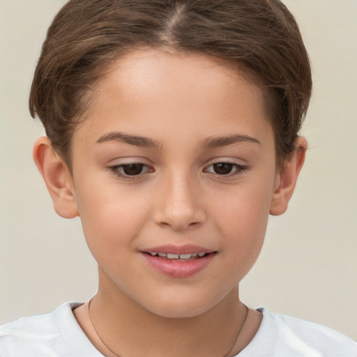 Joyful white child female with short  brown hair and brown eyes