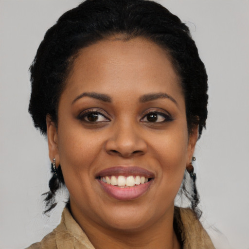 Joyful latino young-adult female with long  black hair and brown eyes