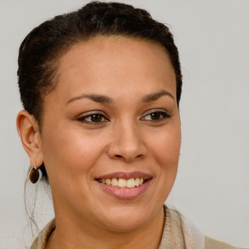 Joyful white young-adult female with short  brown hair and brown eyes