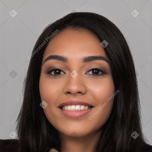 Joyful latino young-adult female with long  black hair and brown eyes