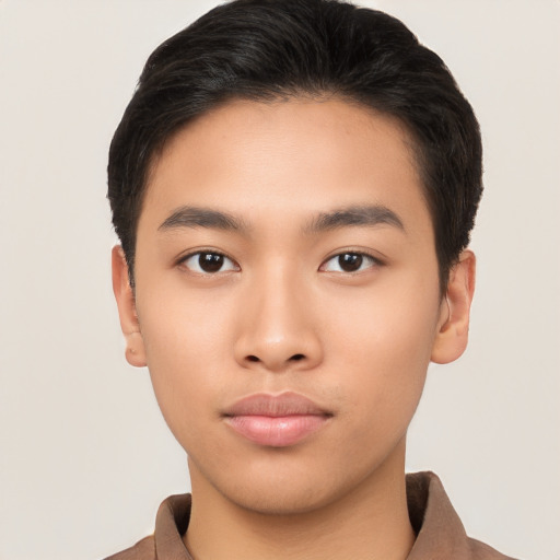 Neutral asian young-adult male with short  brown hair and brown eyes