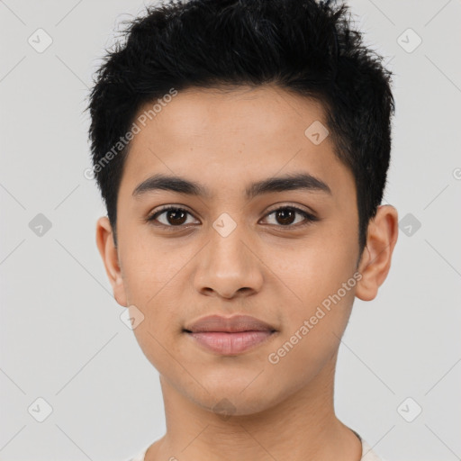 Joyful latino young-adult male with short  black hair and brown eyes