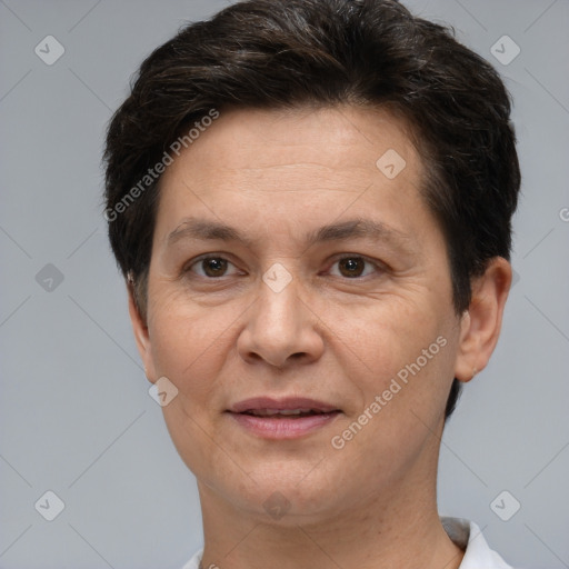 Joyful white adult female with short  brown hair and brown eyes