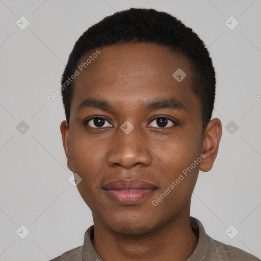 Joyful black young-adult male with short  black hair and brown eyes