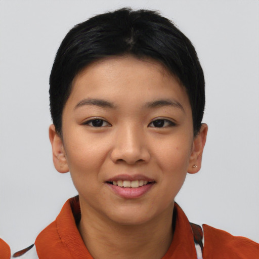 Joyful asian young-adult female with short  black hair and brown eyes