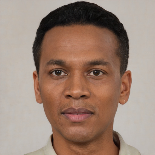Neutral black young-adult male with short  black hair and brown eyes
