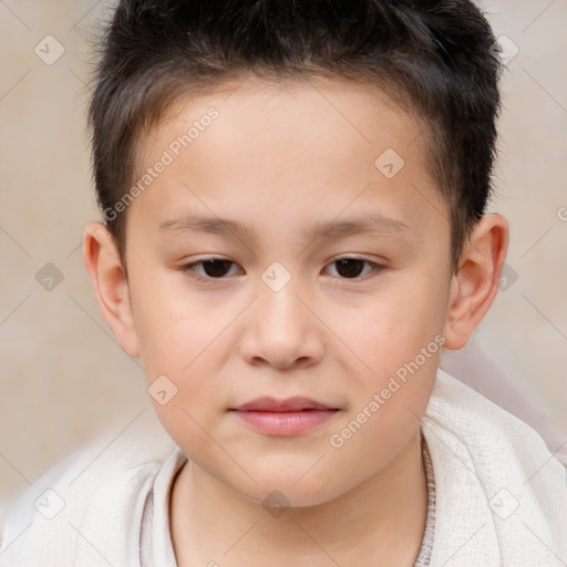 Joyful white child male with short  brown hair and brown eyes