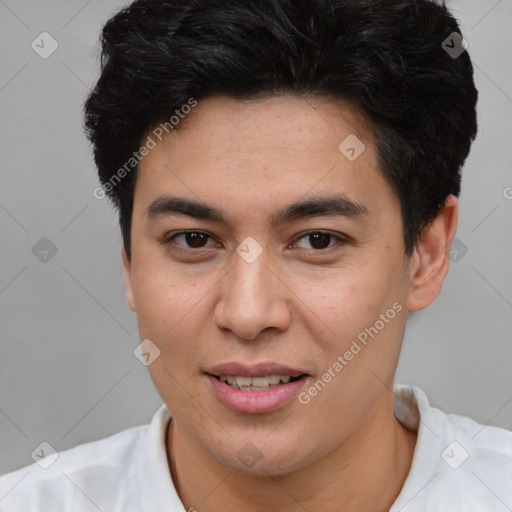 Joyful latino young-adult male with short  brown hair and brown eyes