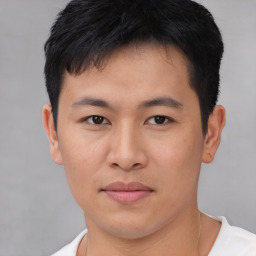 Neutral asian young-adult male with short  brown hair and brown eyes