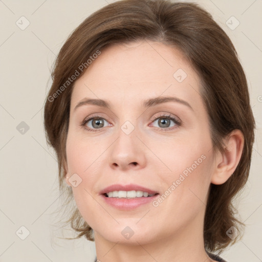 Joyful white young-adult female with medium  brown hair and green eyes