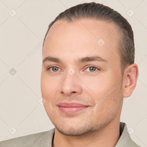 Joyful white young-adult male with short  brown hair and brown eyes