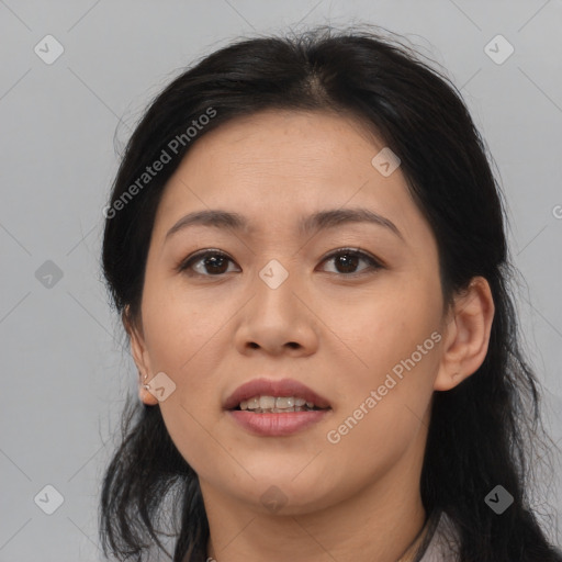 Joyful asian young-adult female with medium  brown hair and brown eyes