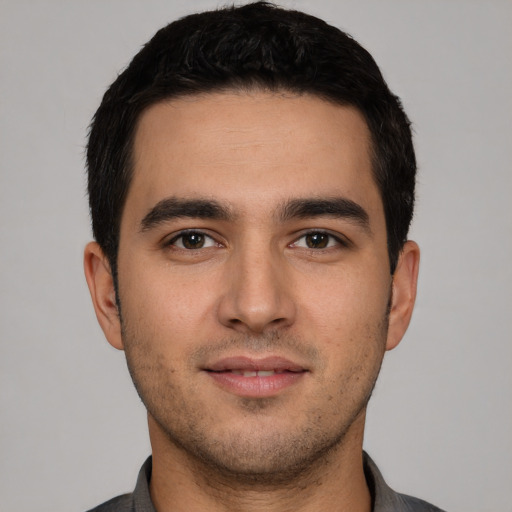 Neutral white young-adult male with short  black hair and brown eyes