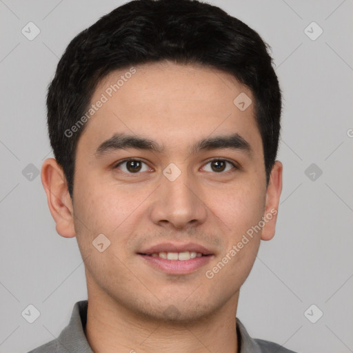 Joyful latino young-adult male with short  black hair and brown eyes