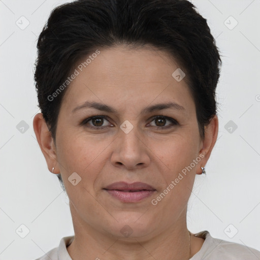 Joyful white adult female with short  brown hair and brown eyes