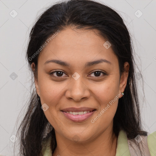 Joyful latino young-adult female with medium  brown hair and brown eyes