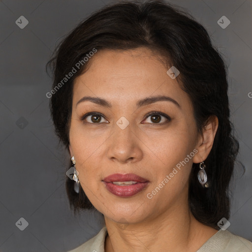 Joyful white adult female with medium  brown hair and brown eyes