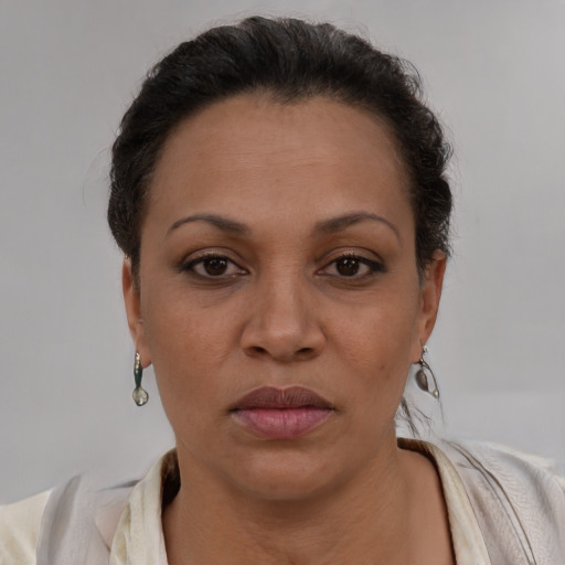 Neutral latino young-adult female with short  brown hair and brown eyes
