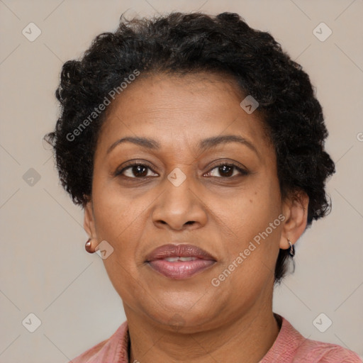 Joyful latino adult female with short  brown hair and brown eyes