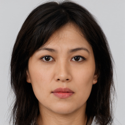 Neutral asian young-adult female with long  brown hair and brown eyes