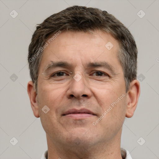 Neutral white adult male with short  brown hair and brown eyes